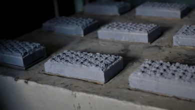 A Kenyan engineer has developed a way to build low-cost housing from a commonly discarded material, creating more than 100 jobs in the process.